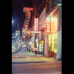 Vancouver's Hastings Street circa late 1980s, looking west from Main Street, sidewalk night shot with neon signs